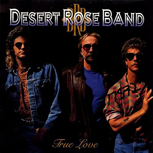 Vinyl album cover featuring three band members wearing sunglasses against a dark background.