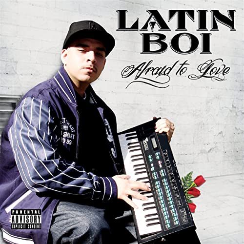 Latin Boi album cover featuring a man with a keyboard and roses.