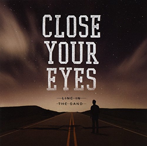 "Album cover with a person standing on a road under a starry sky."