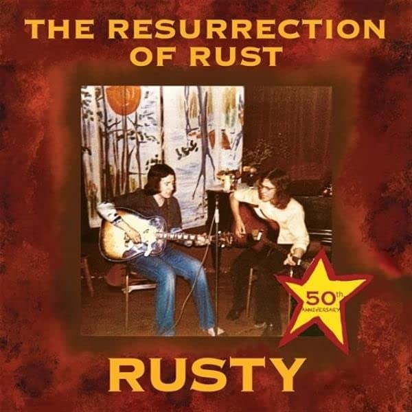 Album cover featuring a seated guitarist and a woman with a 50th anniversary badge.