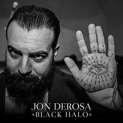 Black and white album cover with a man showing a hand with an eye drawn on it.