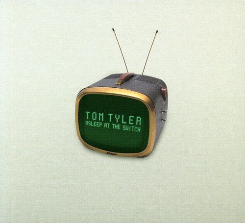 Vintage television with green screen displaying "Tom Tyler - Asleep At The Switch" on a plain background.