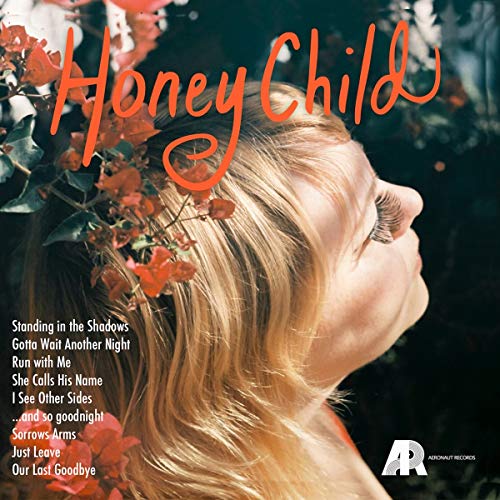 CD cover: woman’s face with red flowers, text “Honey Child”.