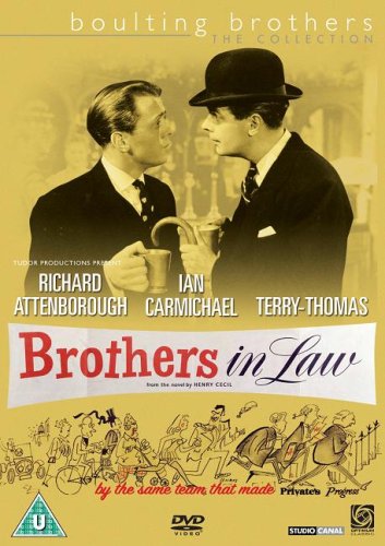 "Yellow DVD cover featuring two men in suits and a bowler hat."