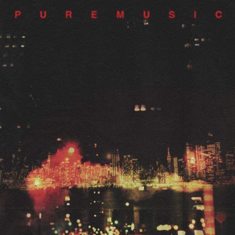 Album cover for "Pure Music" with a blurred city skyline at night.