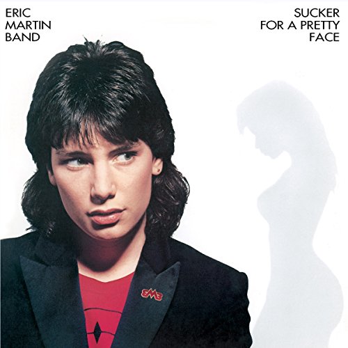Album cover featuring Eric Martin and a faded silhouette of a woman.