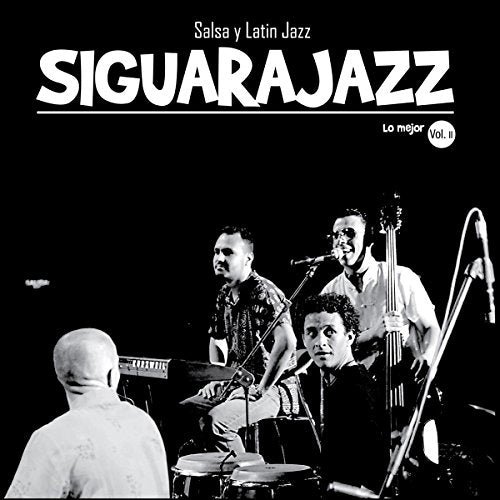"Black and white vinyl album cover featuring a jazz band performing on stage."