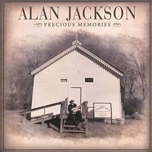 Alan Jackson's "Precious Memories" CD cover featuring a white church and guitarist.