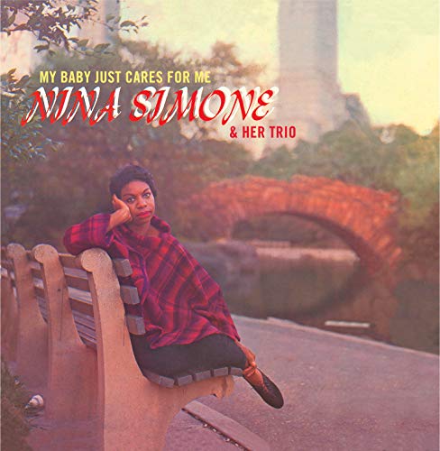 Nina Simone album cover, featuring her seated on a park bench.