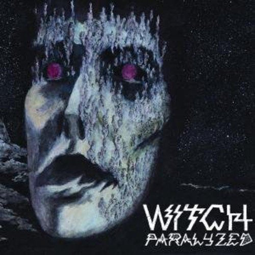 Dark, distorted face with glowing eyes, album cover for "Witch - Paralyzed".
