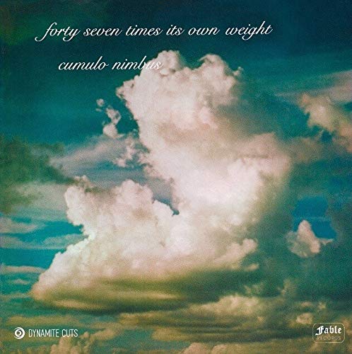 A vinyl record cover featuring a large white cloud against a blue sky.