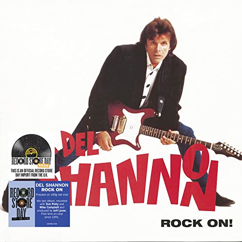 Del Shannon playing a red electric guitar on album cover.