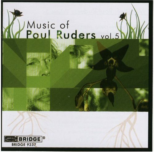 "CD cover with green and white design, featuring flowers and a man's face."