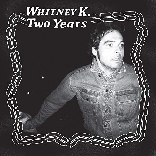 Black and white album cover featuring a portrait of Whitney K.