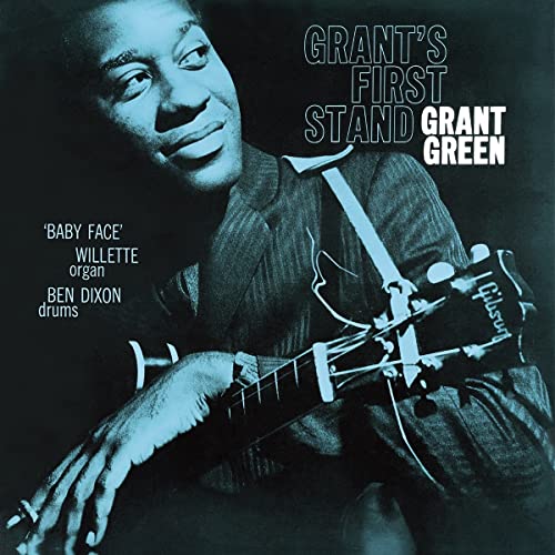 Grant Green album cover featuring a portrait with a guitar.