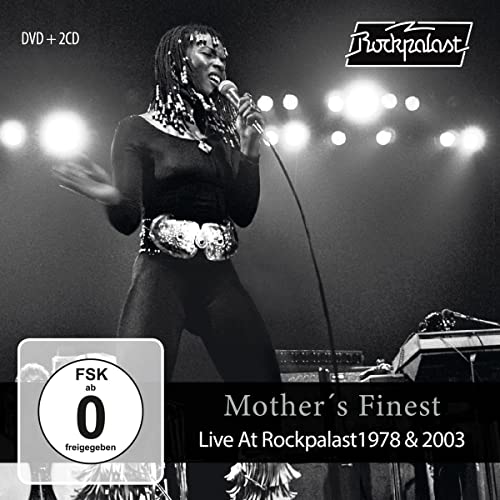 Black and white album cover featuring a singer with dreadlocks performing live.
