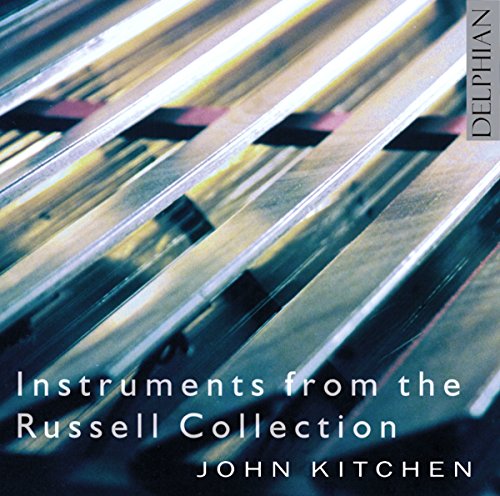 "CD cover with diagonal metallic pipes and white text."