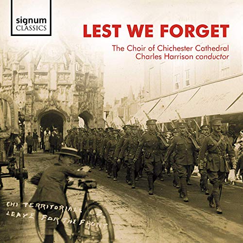 "Lest We Forget" CD cover featuring a sepia-toned image of marching soldiers.