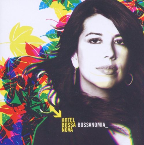 "Album cover featuring a woman's face surrounded by colorful leaves and text."