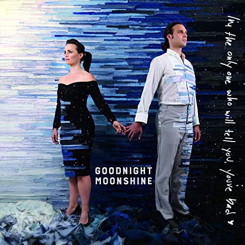 Vinyl album cover featuring a man and woman holding hands against a blue background.