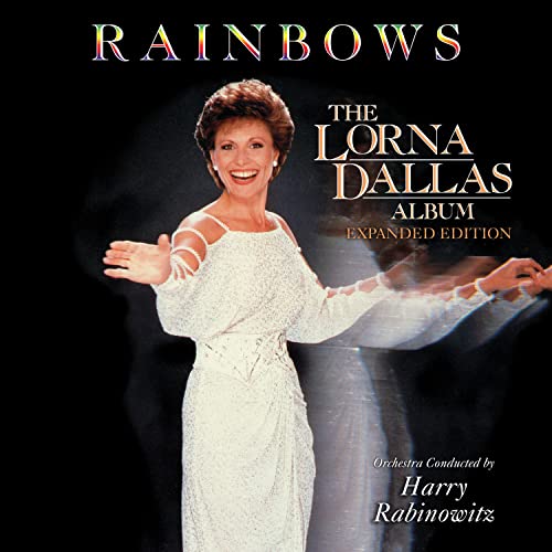 Lorna Dallas album cover, "Rainbows," featuring a smiling woman in a white dress.
