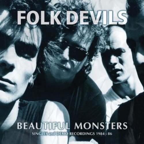 "Black and white album cover featuring three men, titled 'Folk Devils - Beautiful Monsters'."