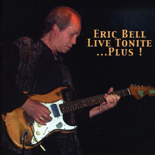 "CD cover featuring a man playing an electric guitar against a black background."