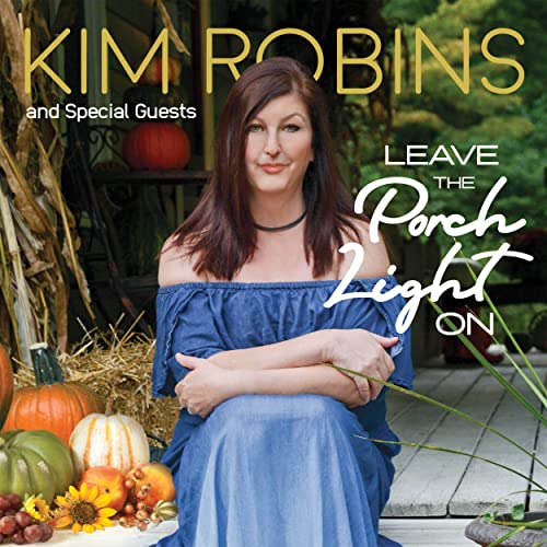 CD cover: Kim Robins portrait with pumpkins and autumn foliage.