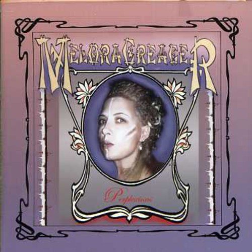 "Album cover with woman's portrait, ornate frame, and artist's name in stylized font."