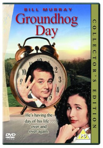 Groundhog Day DVD cover featuring Bill Murray and an alarm clock.