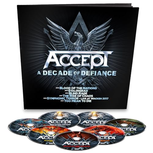 Accept "A Decade Of Defiance" CD with eight discs and eagle logo.