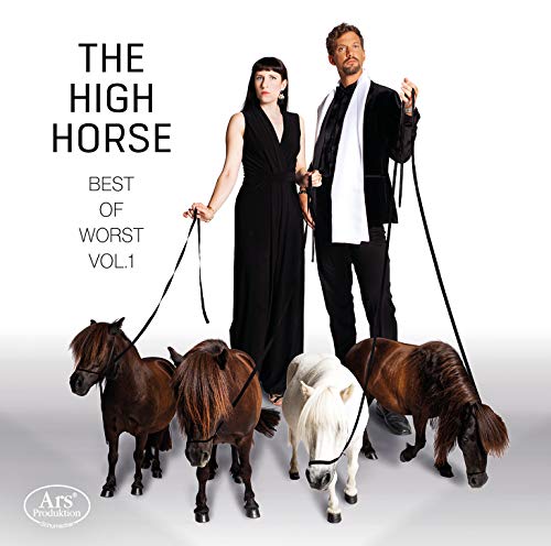 Two people with miniature horses on leads, album cover art.