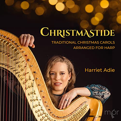 Harriet Adie’s “Christmastide” CD cover featuring a harpist and golden bokeh.