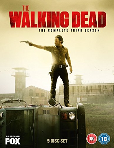 "DVD cover of The Walking Dead Season 3 featuring Rick Grimes holding a gun."