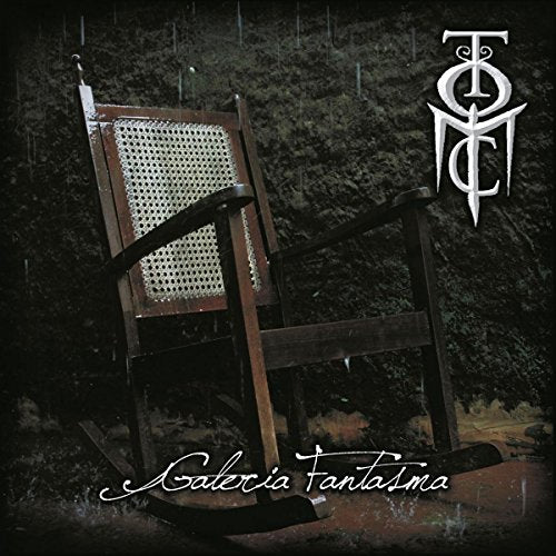 Dark album cover featuring an antique rocking chair and ornate logo.