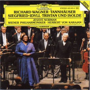 Jessye Norman in blue dress on stage with orchestra behind her, CD cover image.