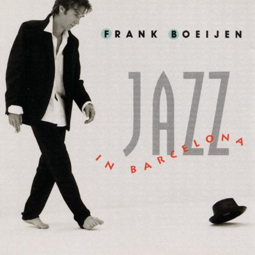 "Album cover with man walking, hat on floor, and 'Jazz in Barcelona' text."