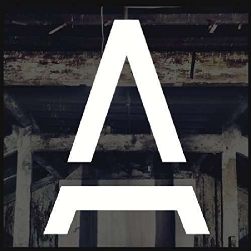 The image depicts a white stylized letter "A" on a dark, grimy background. Alt text: White stylized letter A on a grimy, dark background.