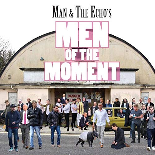 "Album cover with men standing outside a building, text 'Men of the Moment'."