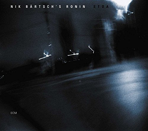 "Blurry, dark album cover with 'Nik Bärtsch's Ronin Stoa' text at the top."
