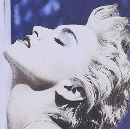 "CD cover featuring a black and white close-up of Madonna with her eyes closed."