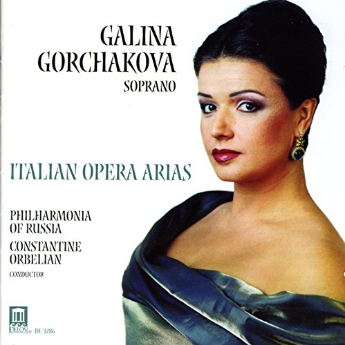 CD cover featuring a woman in a blue dress, white background.