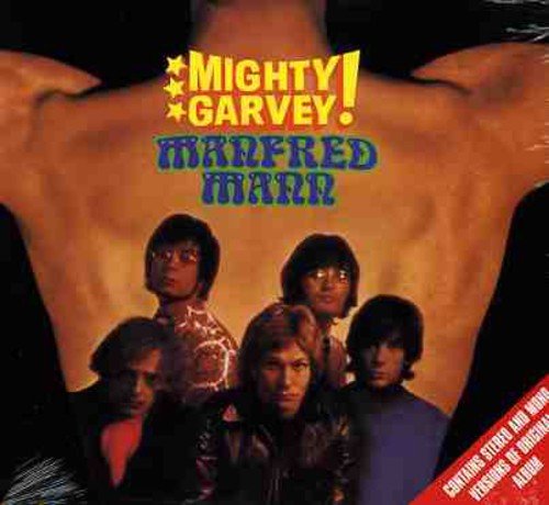 "Manfred Mann's 'Mighty Garvey' album cover featuring a shirtless man and five band members."