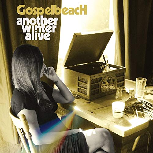 "Album cover featuring a woman sitting by a table with a vintage record player."