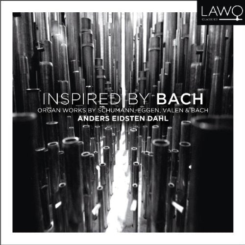 Black and white organ pipes with white text overlay on a CD cover.