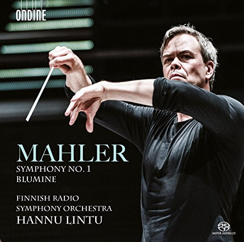 Conductor in black shirt holding baton, with text overlay on dark background.