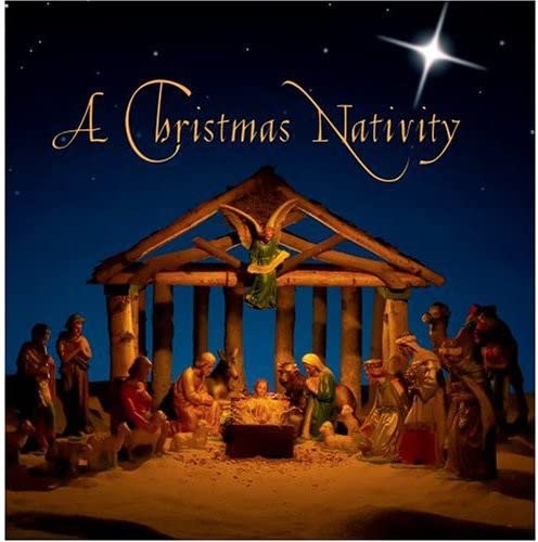 Nativity scene with angel, Mary, Joseph, and baby Jesus in a stable.