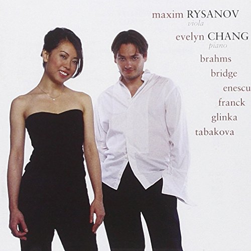 A man and woman standing together, classical music CD cover with text.