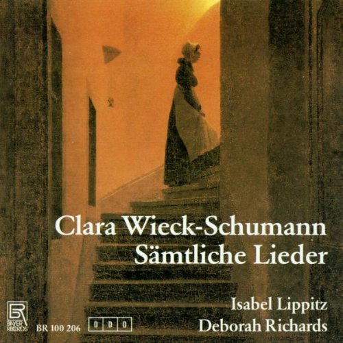 "CD cover featuring a woman in a long dress on a staircase."