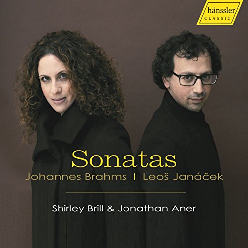 CD cover featuring a man and woman in black coats against a brown background.